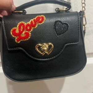 Black Handbag with Heart Accents